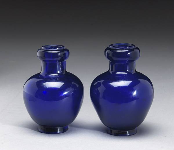 Appraisal: A pair of cobalt blue Peking glass vases Qianlong Marks