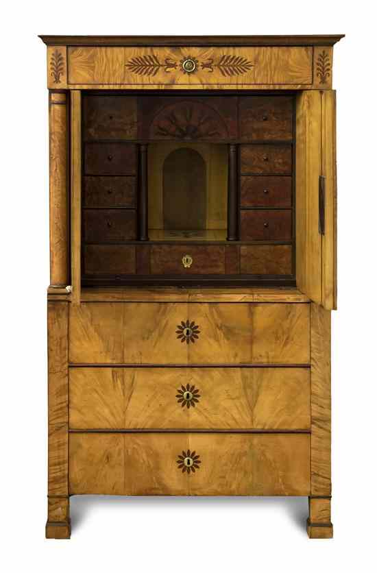 Appraisal: A Biedermeier Satinwood Secretaire a Abattant the rectangular top over