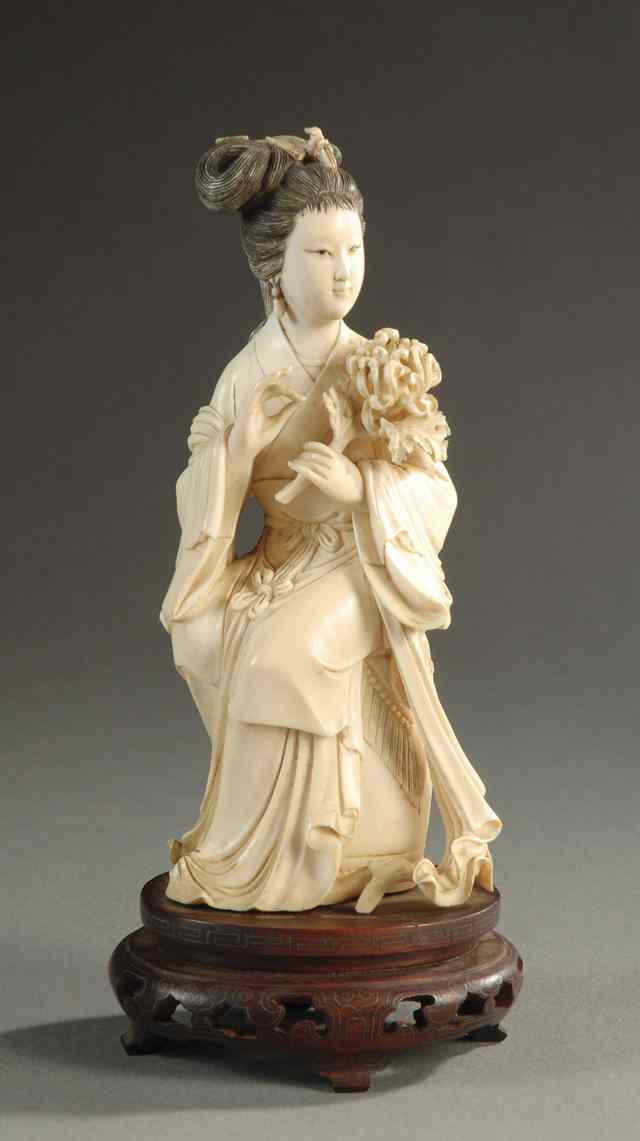 Appraisal: CHINESE IVORY CARVED FIGURE of woman seated on drum stool