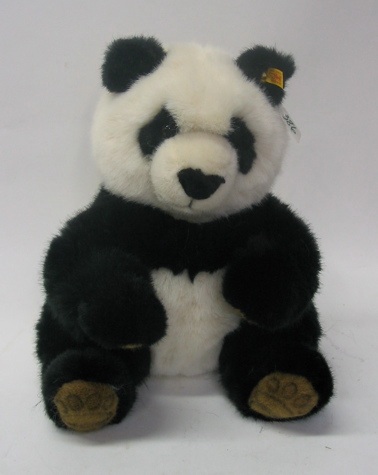 Appraisal: A GERMAN STEIFF PANDA BEAR with original Steiff ear tag