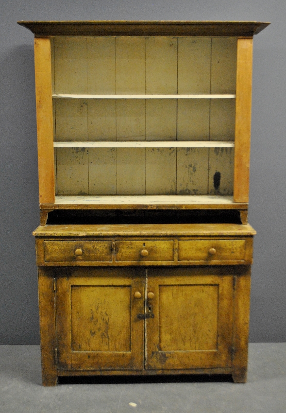 Appraisal: - Two-piece open Dutch cupboard c with mustard yellow paint