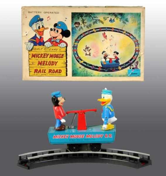 Appraisal: Walt Disney Mickey Melody Railroad Batt-Op Toy Description Circa Made