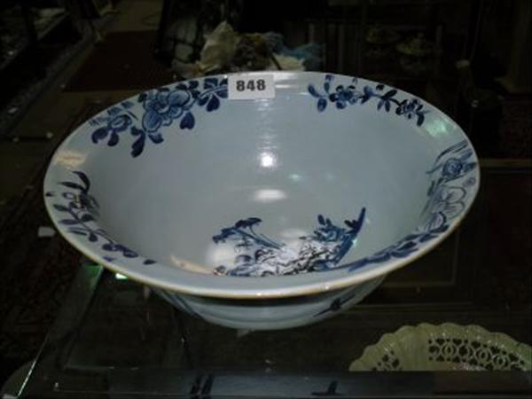 Appraisal: A Delft blue and white bowl possibly Bristol restored