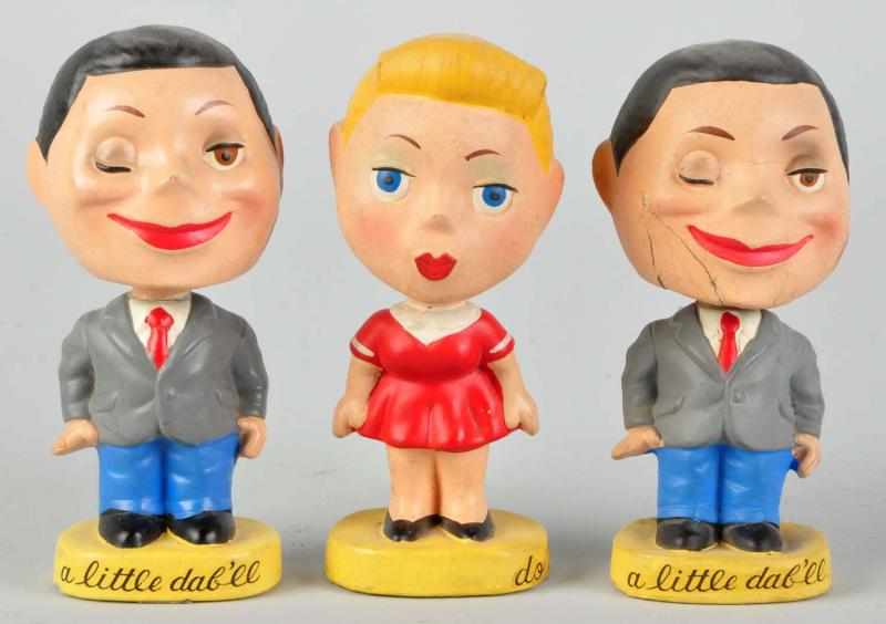 Appraisal: Lot of Paper Mache Brylcream Nodders Includes two men and