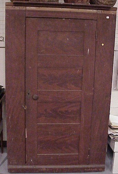 Appraisal: Pine cabinet with grained finish one large four panel door