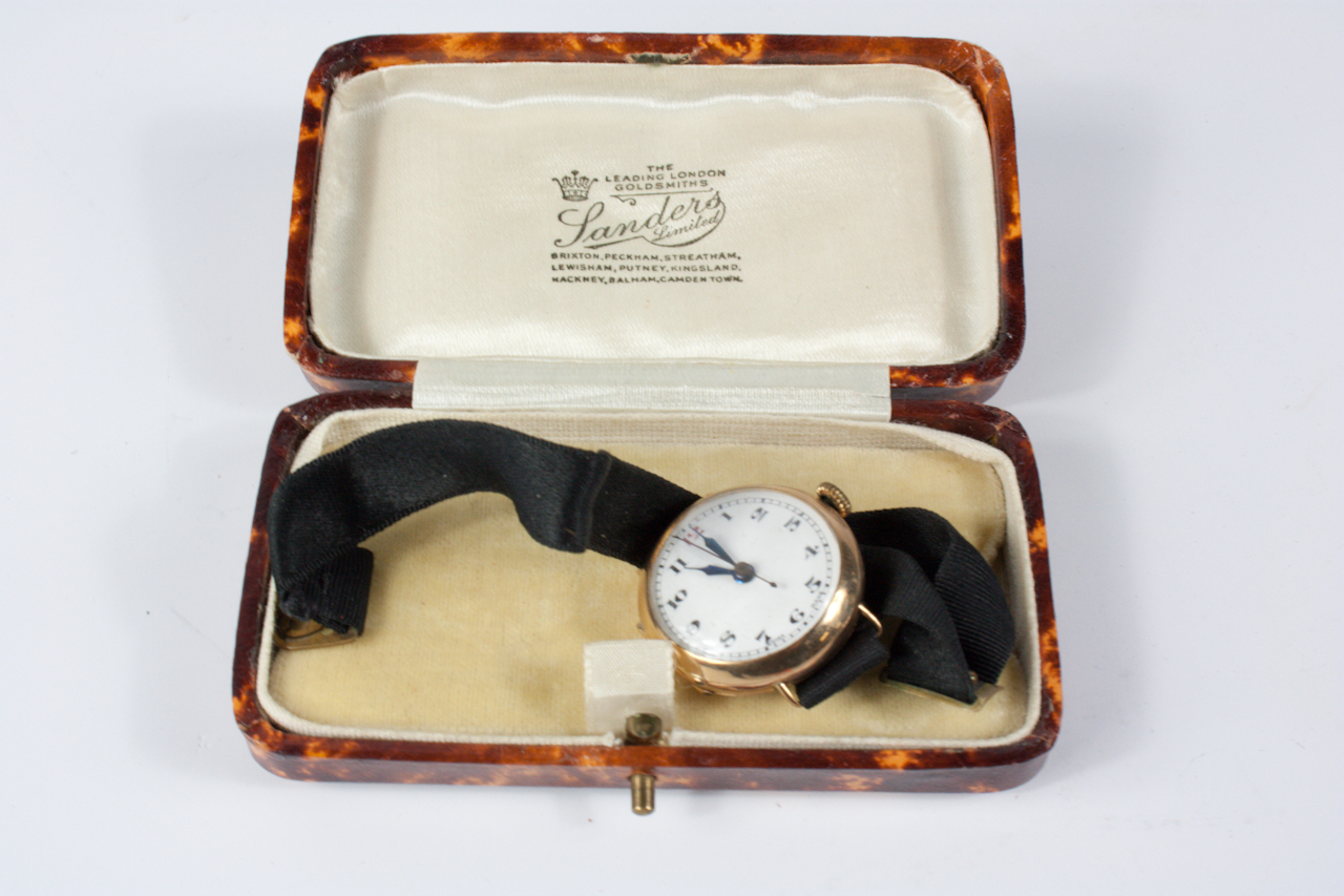 Appraisal: An early thC ct gold cased wristwatch with white enamelled