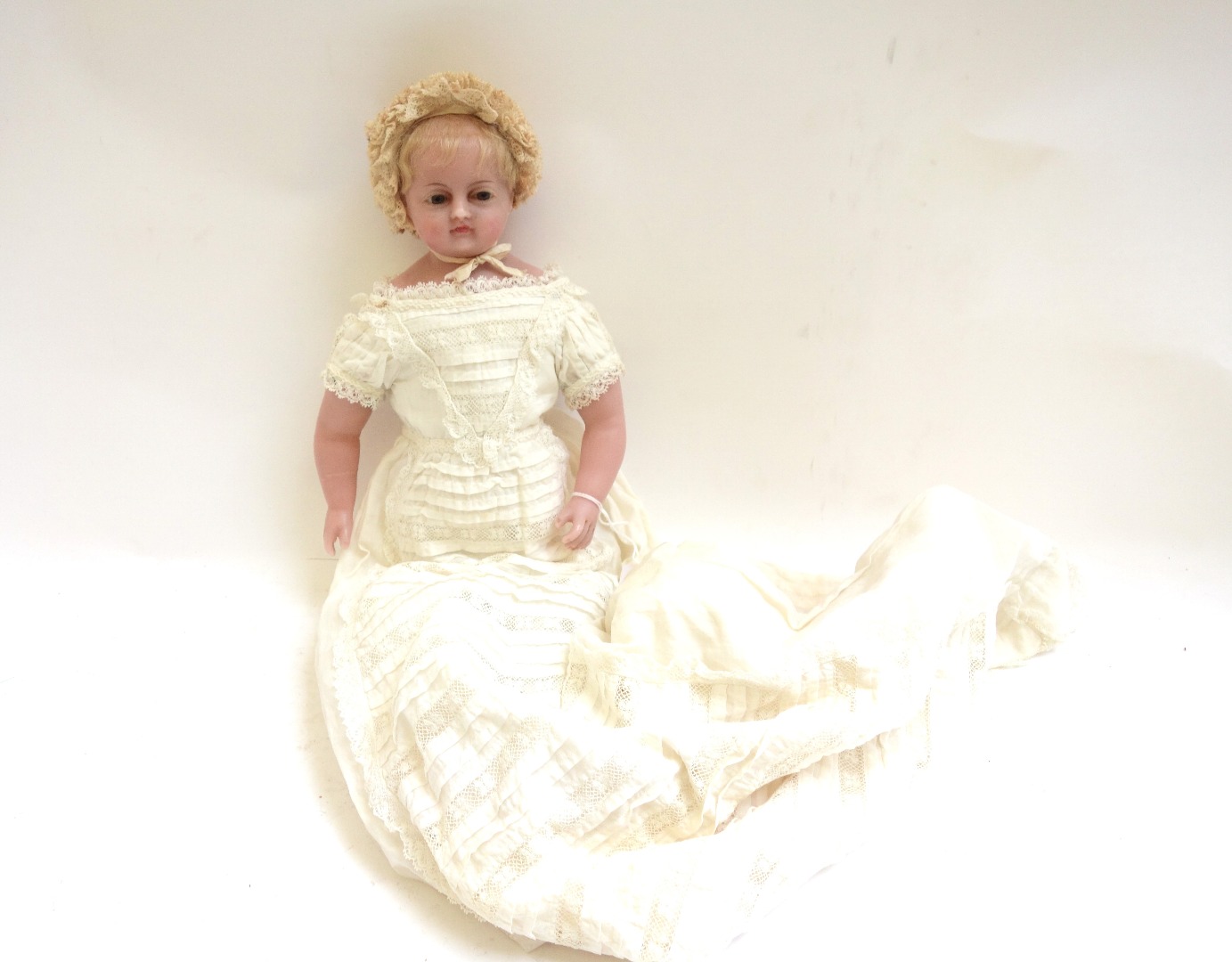 Appraisal: A Continental wax doll late th early th century with