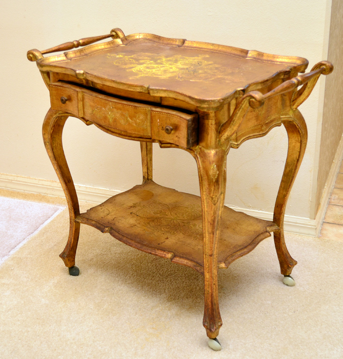 Appraisal: ITALIAN FLORENTINE GILT TEA TABLE Carved and shaped top over