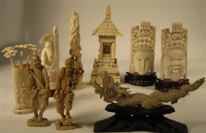 Appraisal: Nine Chinese and Japanese ivory and bone carvingsComprising a pair