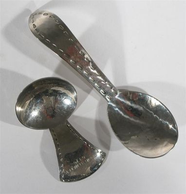 Appraisal: A Keswick School of Industrial Arts hammered steel caddy spoon