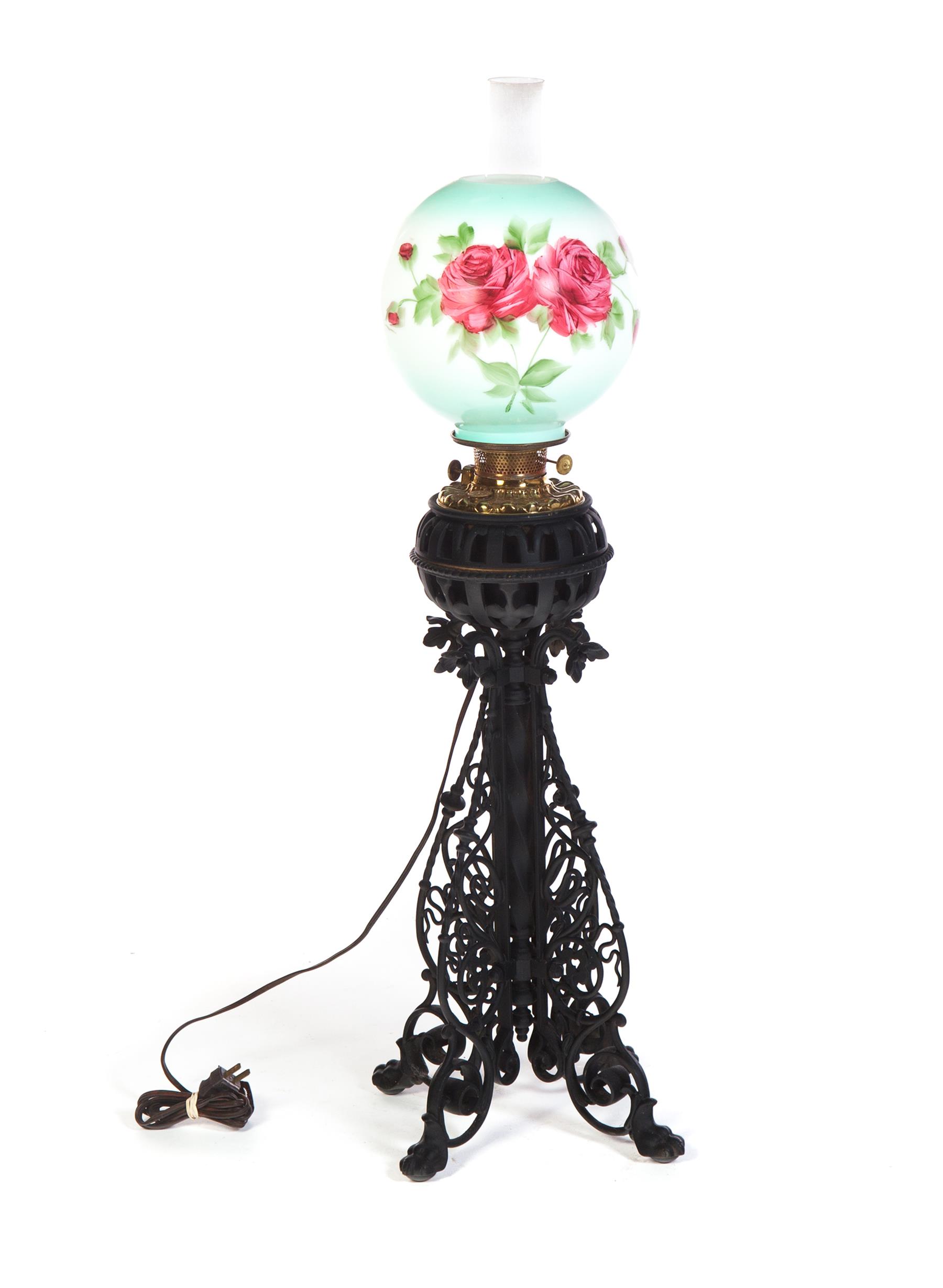 Appraisal: CAST IRON TABLE LAMP WITH BALL SHADE American st quarter-