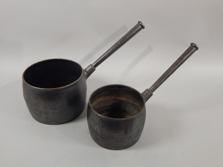 Appraisal: A graduated pair of early thC Wednesbury iron pans each