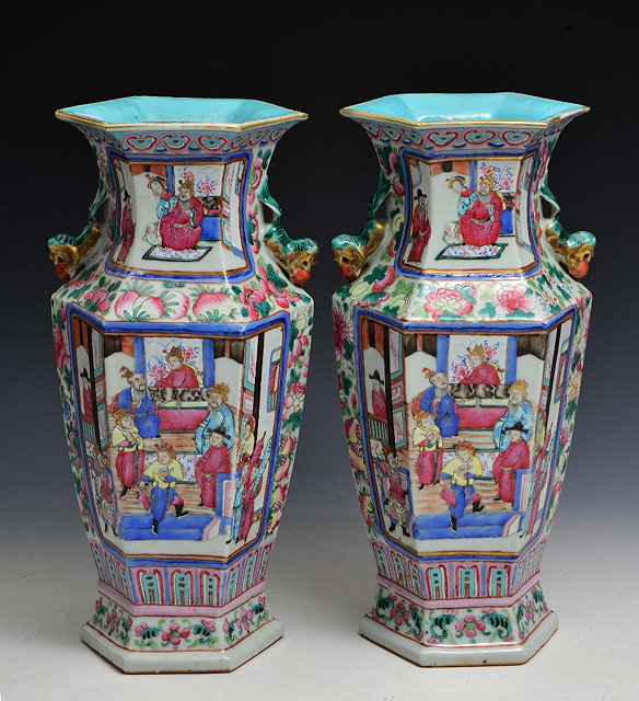 Appraisal: A PAIR OF CHINESE FAMILLE ROSE HEXAGONAL VASES decorated with