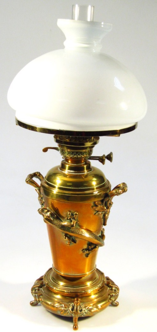 Appraisal: An early thC brass oil lamp in the oriental manner