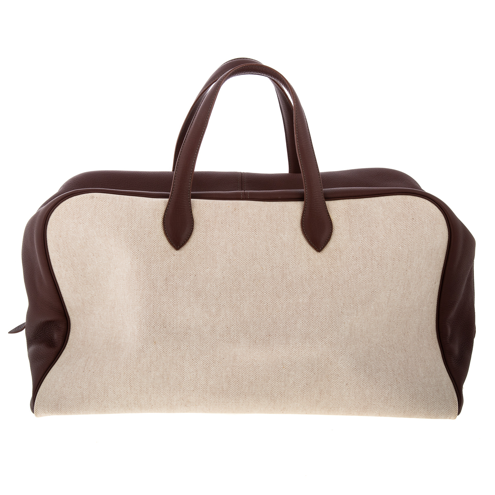 Appraisal: AN HERMES VICTORIA TRAVEL A natural coated canvas Hermes Victoria