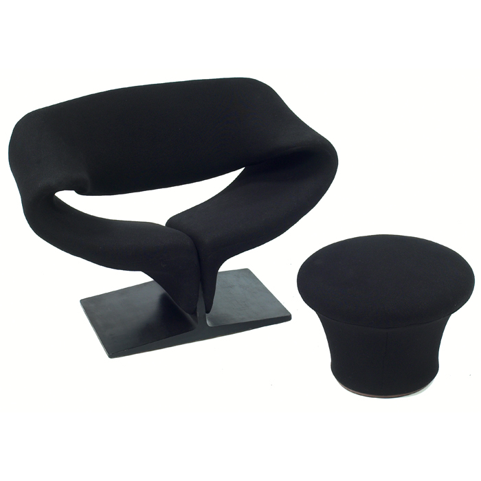 Appraisal: Pierre Paulin ribbon chair and round ottoman black