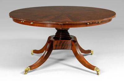 Appraisal: Regency style mahogany dining table circular top with figured veneers