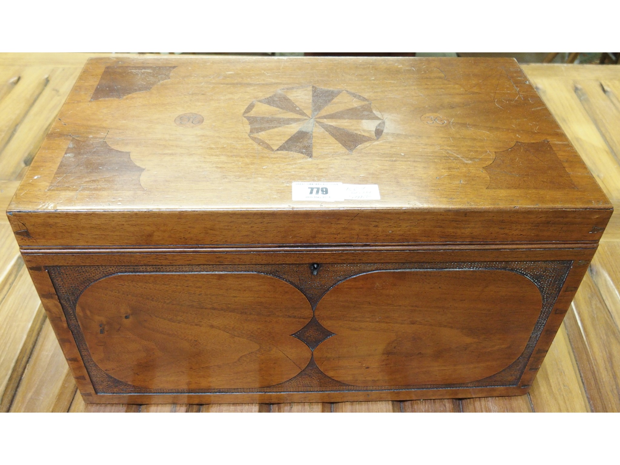 Appraisal: A Victorian inlaid and poker work sewing box and contents