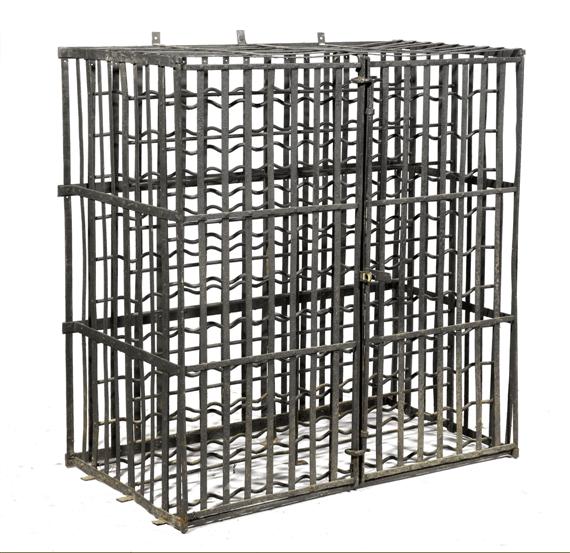 Appraisal: A WINE RACK th c Wrought iron x x cm