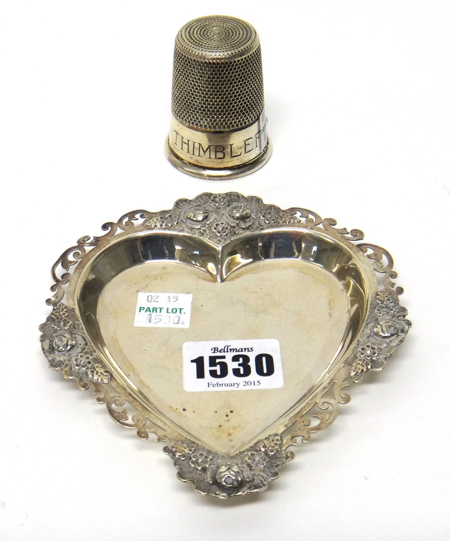 Appraisal: A silver heart shaped trinket dish with embossed decoration Sheffield