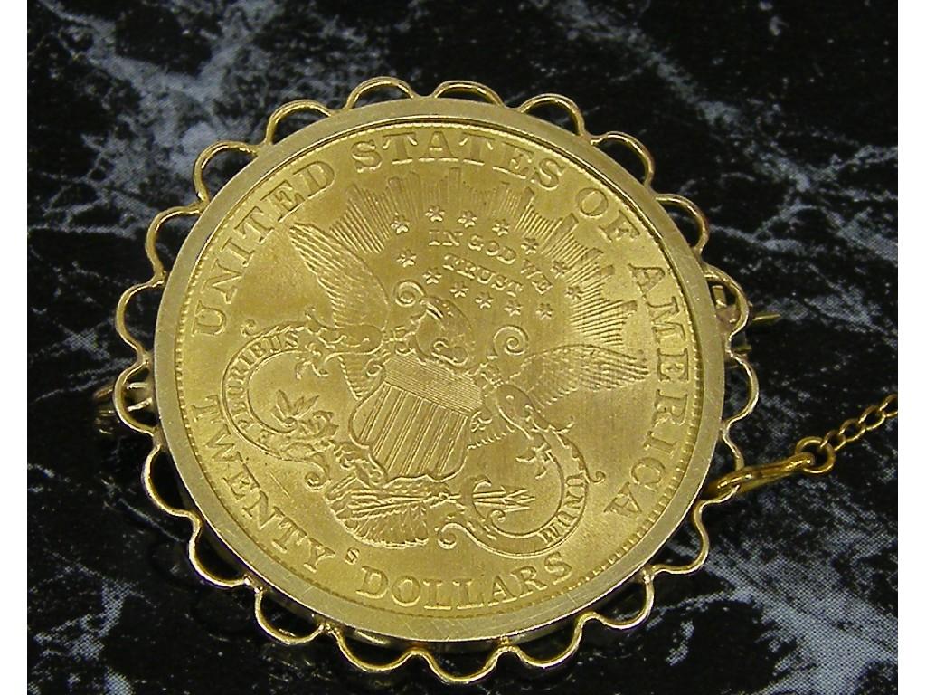 Appraisal: USA gold coin in a ct mount gm