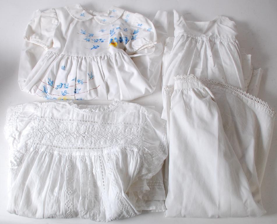 Appraisal: CHILD'S EDWARDIAN WHITE WORK PINAFORE APRON child's Edwardian white work