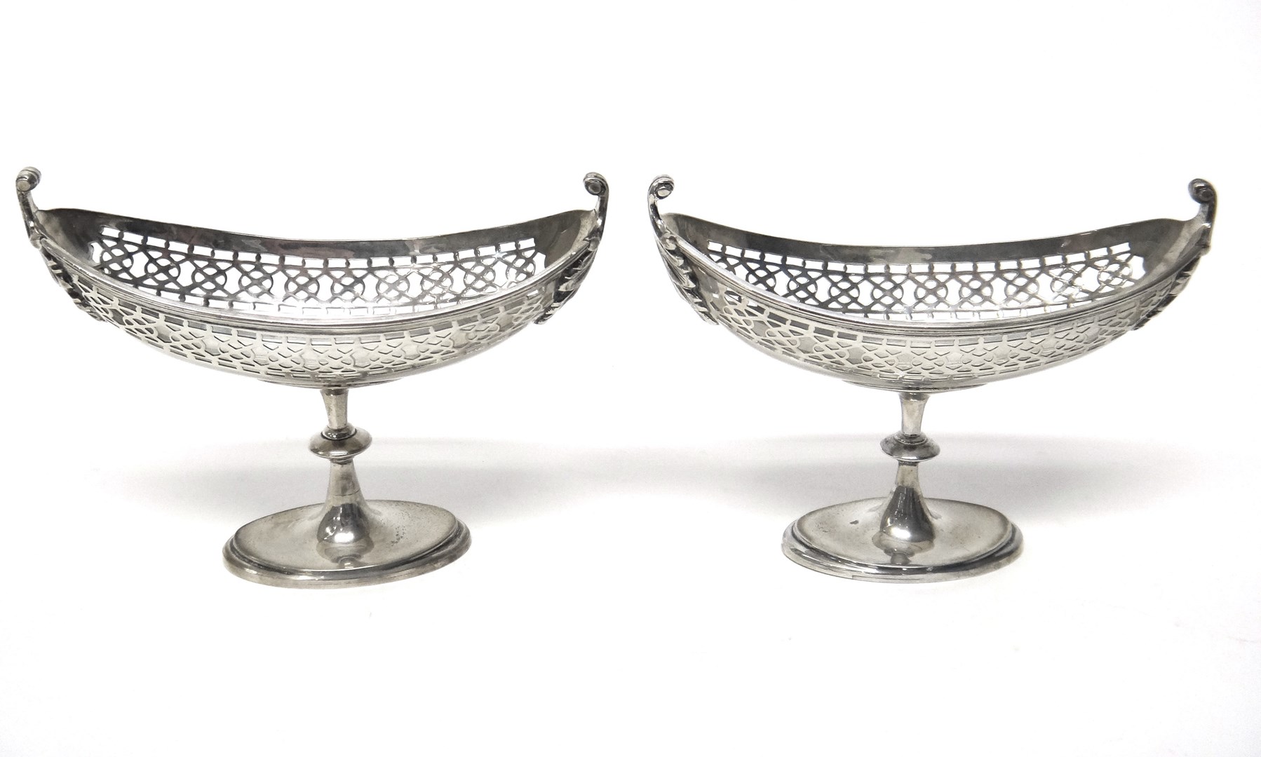 Appraisal: A pair of silver boat shaped bonbon stands each with