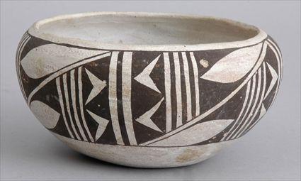 Appraisal: ANASAZI TYPE-GROUND POTTERY BOWL The compressed spherical bowl with vertical