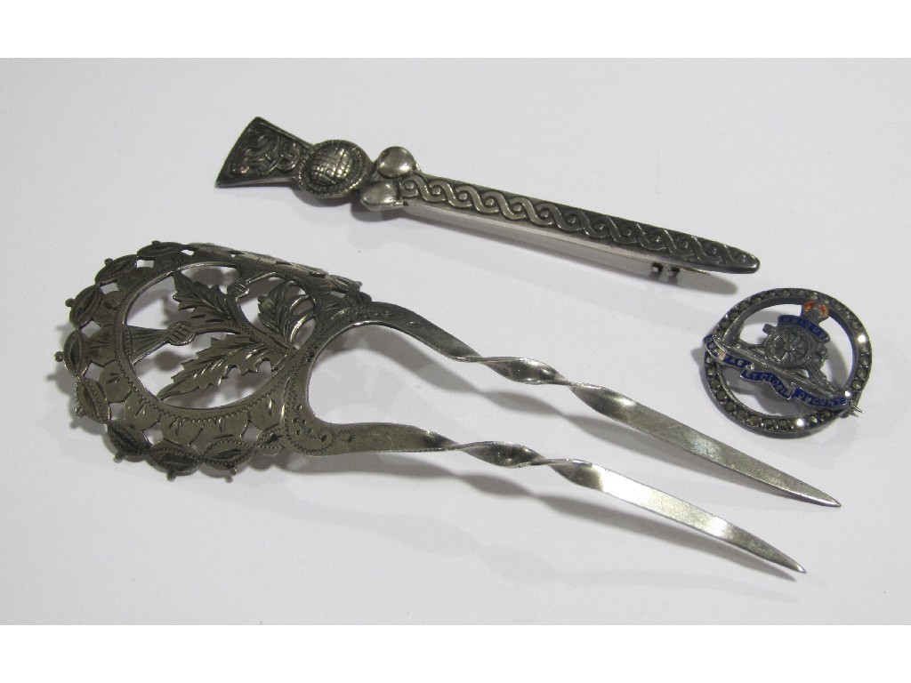 Appraisal: Lot comprising a silver thistle decorated hair ornament a silver