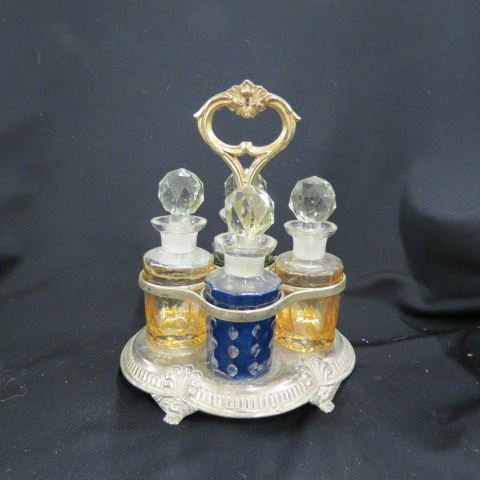 Appraisal: Silverplate Perfume Bottle Set with cut-to-clear bottles