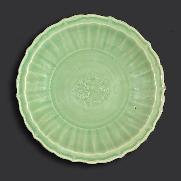 Appraisal: A Longquan celadon dish with scalloped rim Ming Dynasty The