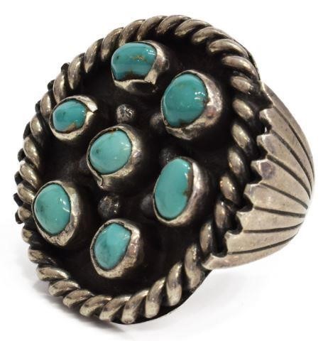 Appraisal: Native American silver content unknown ring with seven turquoise cabochons