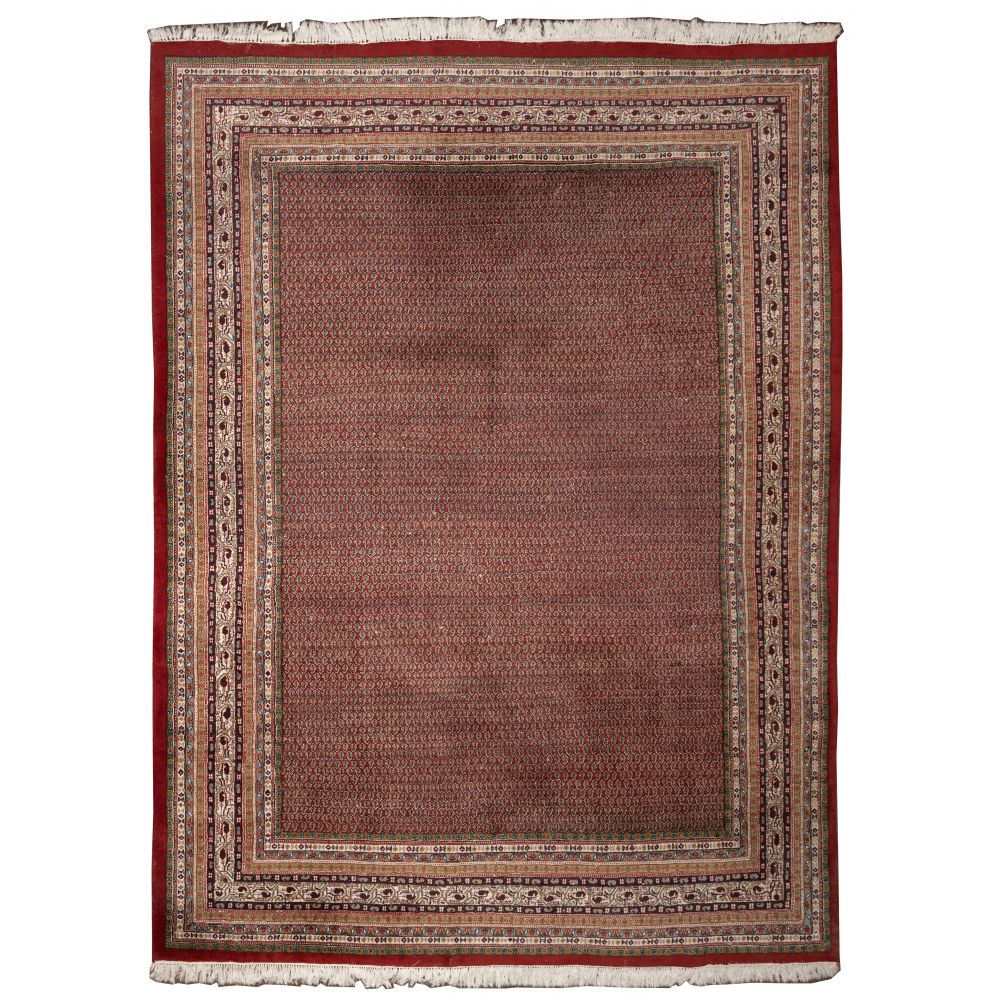 Appraisal: INDO-PERSIAN SERABEND WOOL RUGHandwoven an abstract geometric in a multi