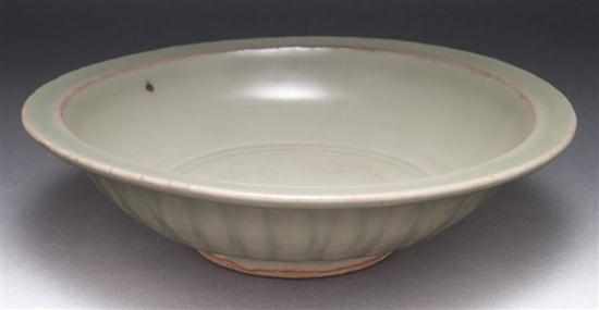 Appraisal: Chinese celadon glaze stoneware dish with fish relief decoration th