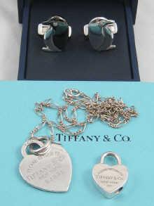 Appraisal: A silver Tiffany heart shaped pendant on chain together with