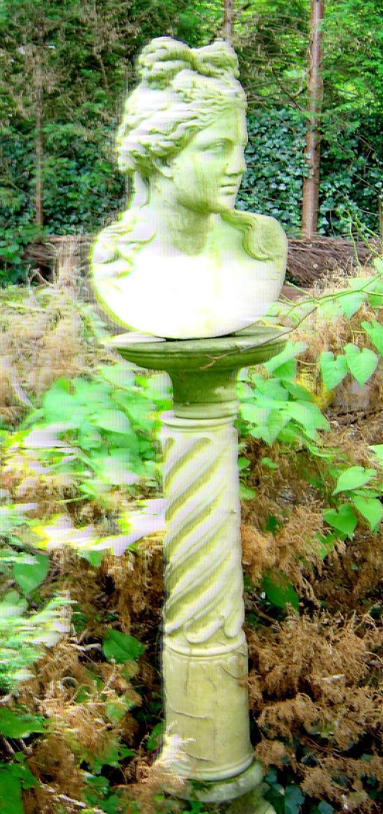 Appraisal: Composition garden statue of a female head on turned column