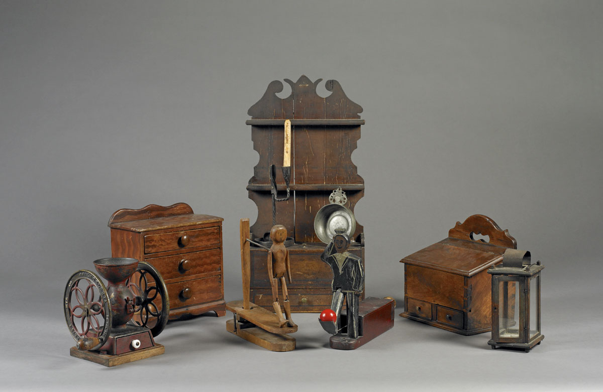 Appraisal: PENNSYLVANIA WALNUT SALT BOX WITH DRAWERS The shaped backboard with