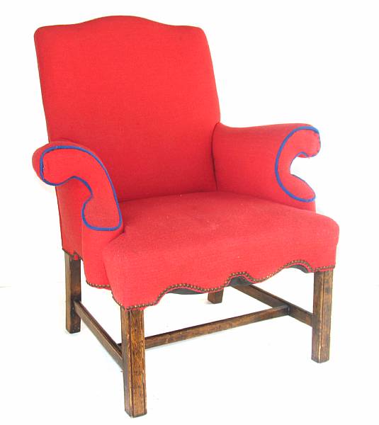 Appraisal: A George III style stained beechwood and red upholstered armchair