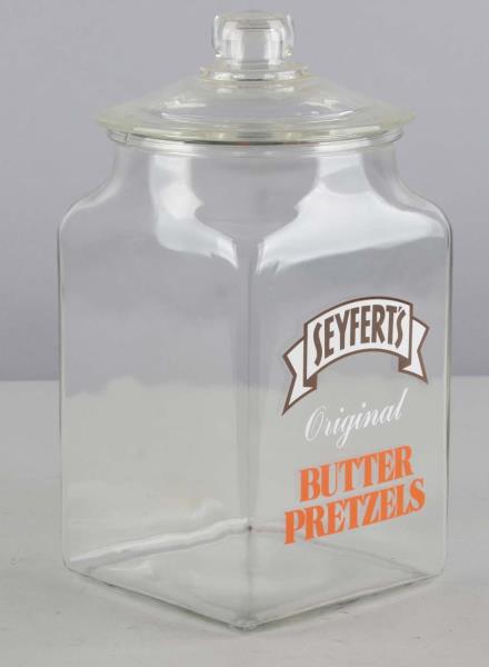 Appraisal: Seyfert's Countertop Pretzel Jar Clear glass with lid and decal