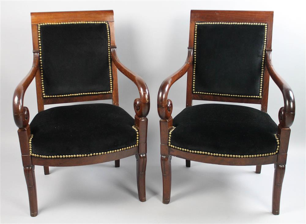 Appraisal: PAIR OF AMERICAN CLASSICAL CARVED MAHOGANY OPEN ARM CHAIRS each