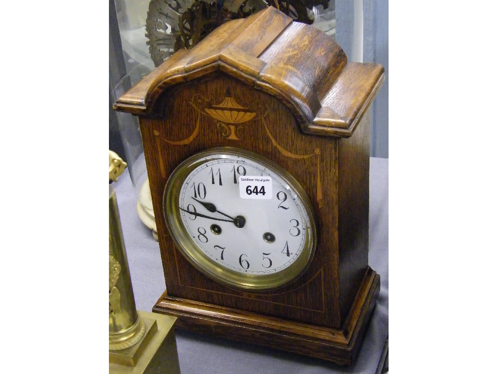 Appraisal: Oak two train mantel clock the Junghans movement striking on