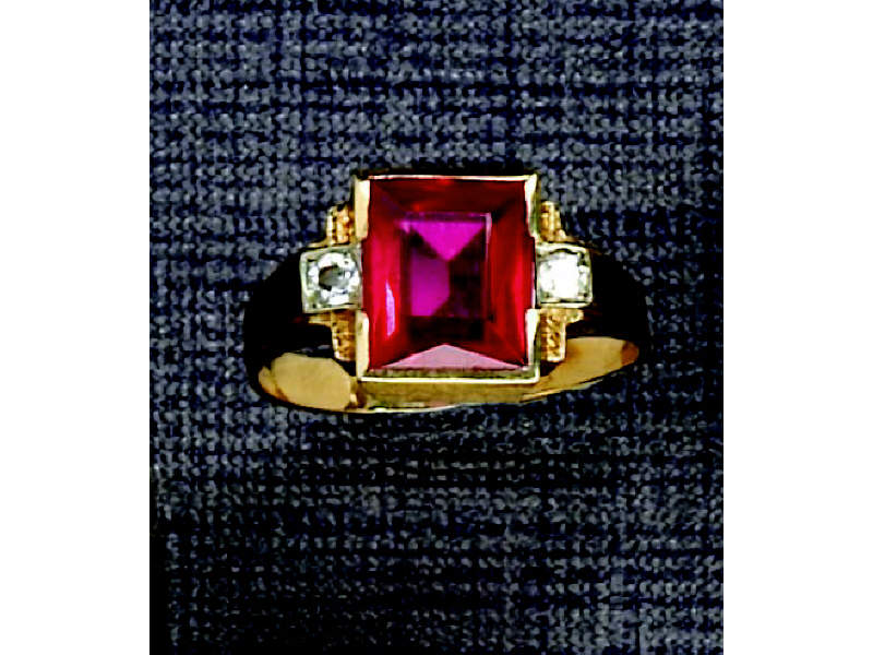 Appraisal: MAN'S RING k yellow gold ring with rectangular faceted synthetic