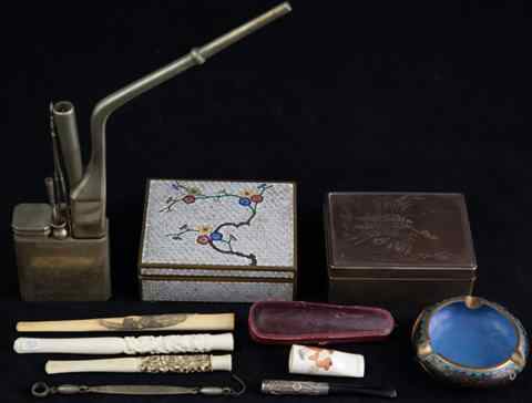 Appraisal: GROUP OF SMOKER'S ACCESSORIES including a Japanese silver cigarette box