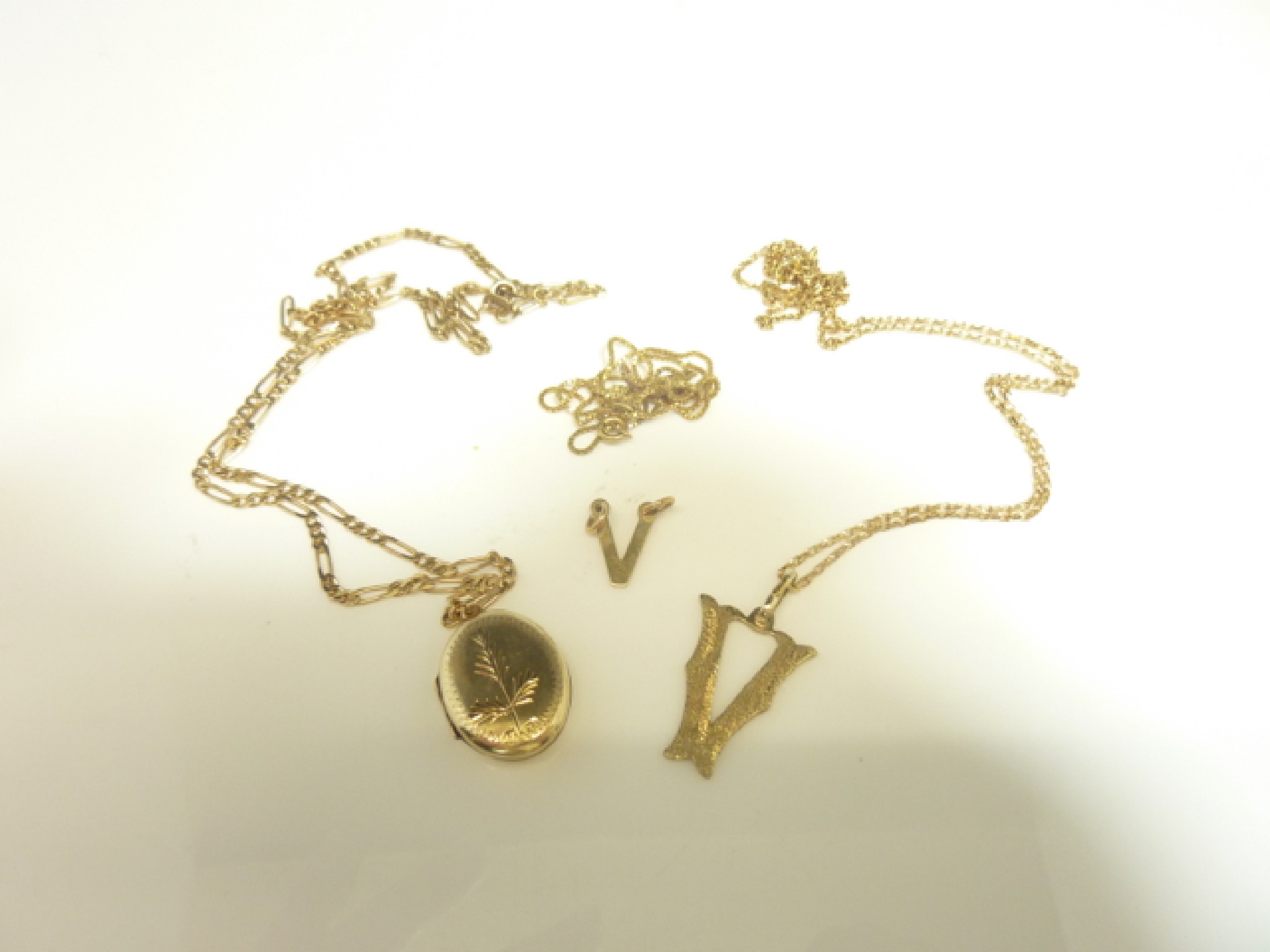 Appraisal: A ct gold necklace the anchor-link chain suspended with a