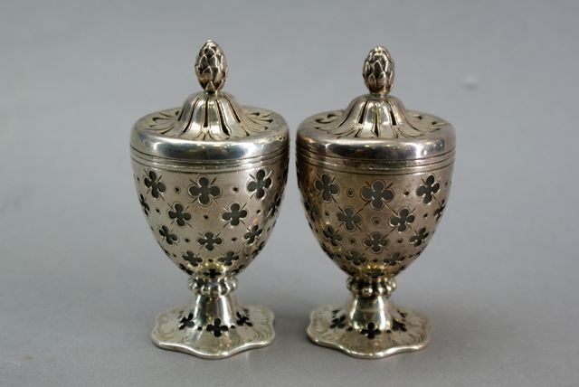 Appraisal: A pair of early Victorian silver urn shaped pedestal castors