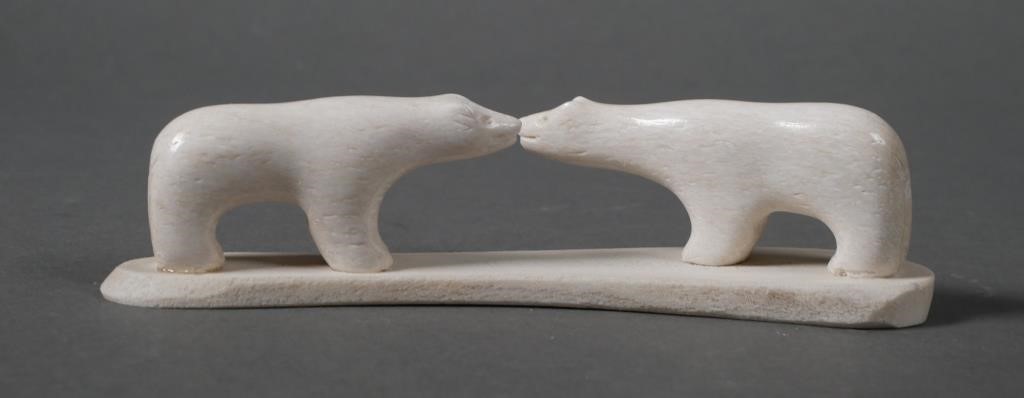 Appraisal: Native American carved bone and two ivory polar bears sculpture