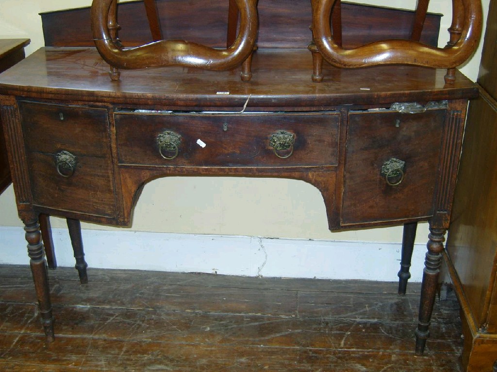 Appraisal: A Regency mahogany bow front sideboard fitted with a central