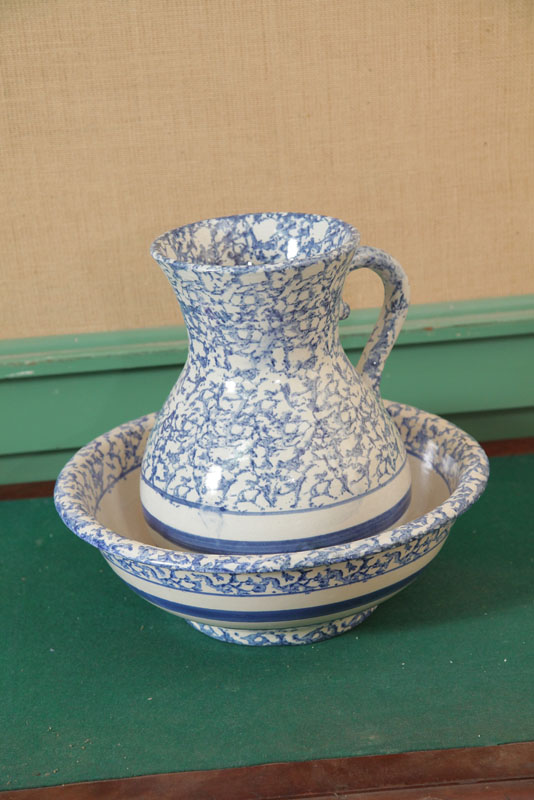 Appraisal: WASH BOWL AND PITCHER Blue and white spongeware with single