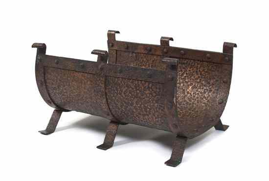 Appraisal: A Hammered Copper Log Rack raised on splayed squat legs