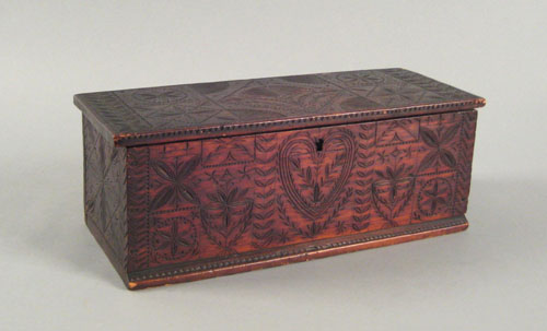 Appraisal: New England Frisian carved pine box th c with hearts